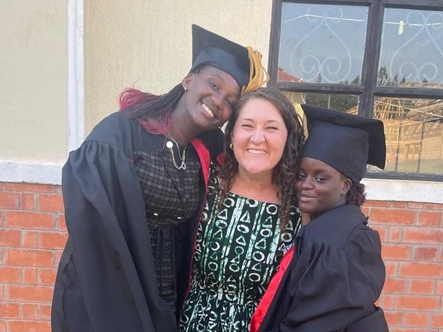 With two graduates in Uganda