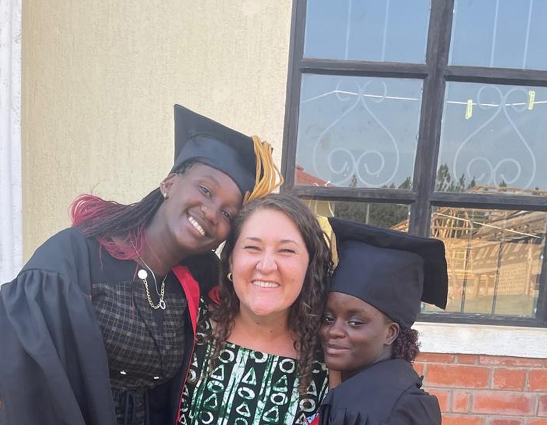 With two graduates in Uganda